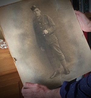 Author holding old photograph